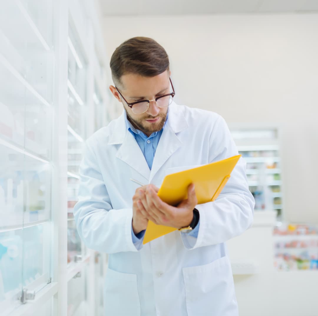 pharmacist greeting a patient inside Greene Medical Arts Pharmacy